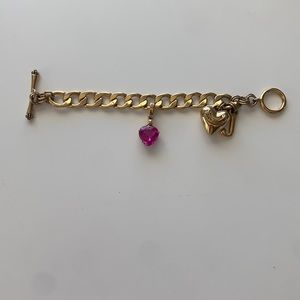 Gold Juicy Couture Starter Charm Bracelet with one charm included